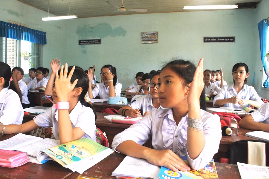 Thông tư 22 đánh giá vì sự tiến bộ của HS, coi trọng sự động viên, khuyến khích HS và sự tương tác giữa thầy và trò. Ảnh tư liệu.
