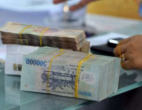Ngan hang Nha nuoc bac tin don doi tien - Anh 1