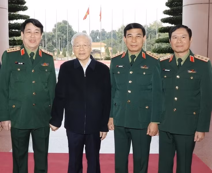 Tổng Bí thư Nguyễn Phú Trọng với các lãnh đạo Quân ủy Trung ương - Bộ Quốc Phòng. (Ảnh: Trí Dũng/TTXVN)