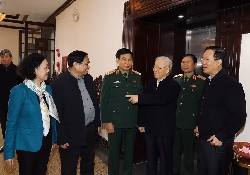 Tổng Bí thư Nguyễn Phú Trọng với lãnh đạo Đảng, Nhà nước, Quân ủy Trung ương tham dự Hội nghị. (Ảnh: Trí Dũng/TTXVN)
