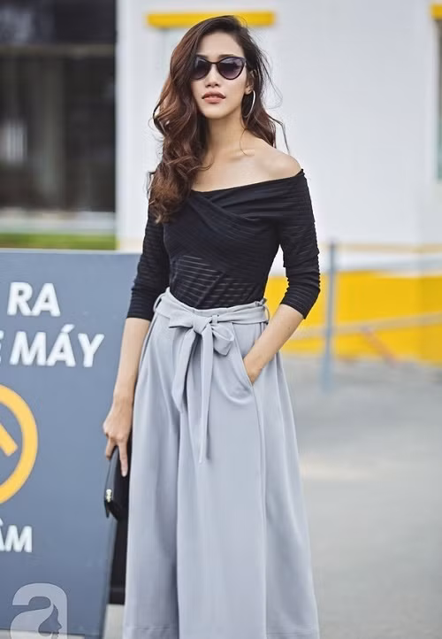 Những chiếc quần ống rộng có belt giúp phần eo trông thon gọn hơn.