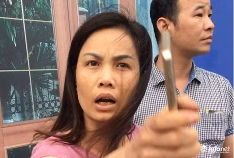 Da xac dinh duoc nguoi phu nu gia danh nha bao, lang ma CSGT - Anh 1
