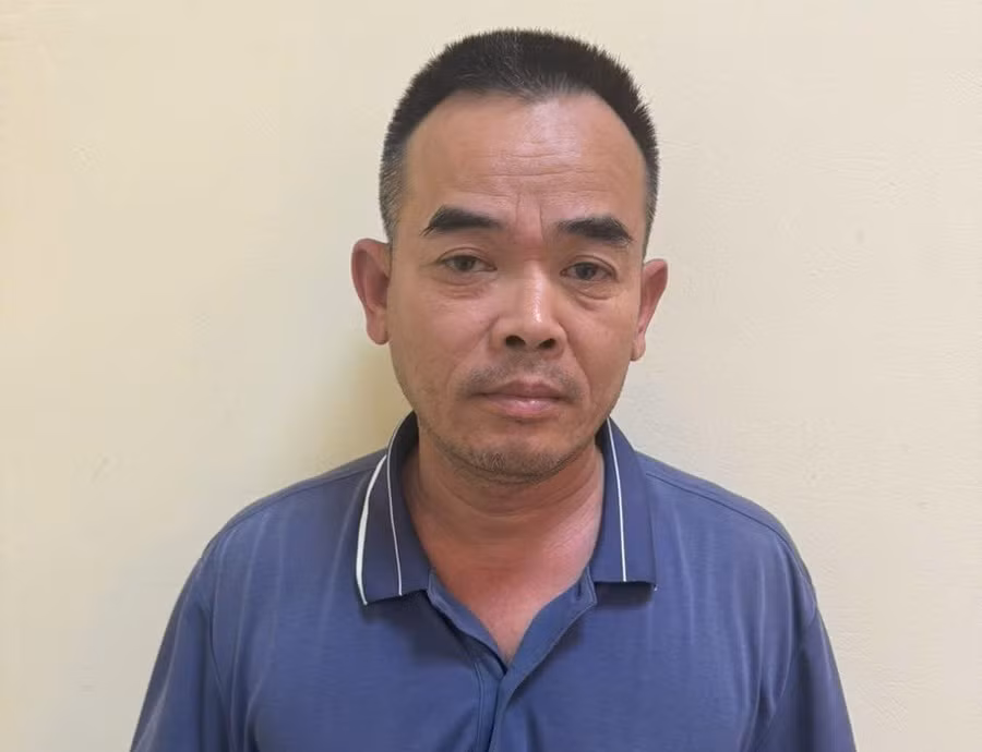 Đinh Văn Long tại cơ quan công an. Ảnh: TG