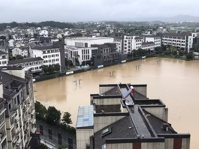 Trung Quốc: Hàng ngàn thí sinh phải hoãn thi ĐH do mưa lũ ảnh 2