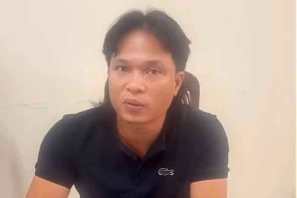 Đối tượng Nguyễn Quang Tuyên làm việc với cơ quan chức năng.