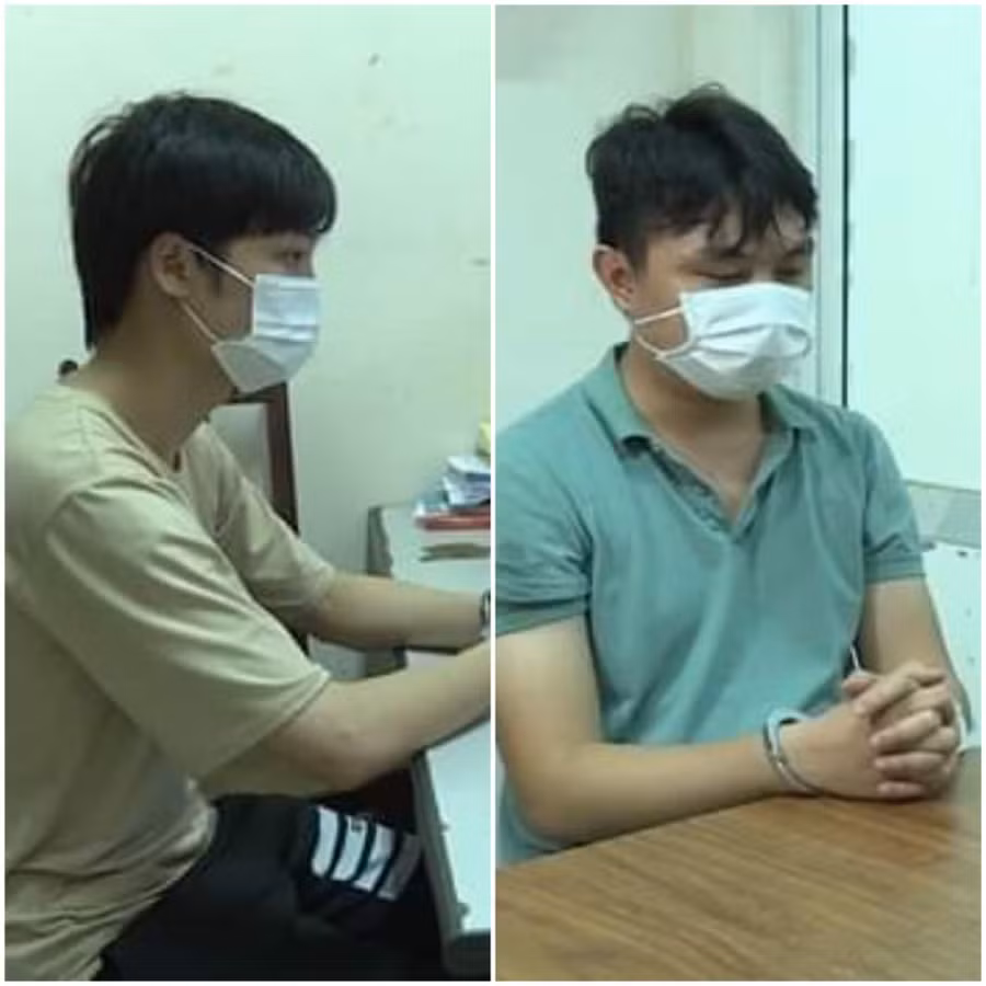 Đỗ Thành Đạt (trái) và Phùng Minh Tuấn tại Cơ quan Công an.